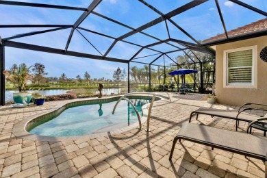 Resort-Style Living Awaits in This Stunning Waterfront Home! on Riverwood Golf Club in Florida - for sale on GolfHomes.com, golf home, golf lot