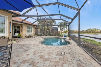 Resort-Style Living Awaits in This Stunning Waterfront Home! on Riverwood Golf Club in Florida - for sale on GolfHomes.com, golf home, golf lot