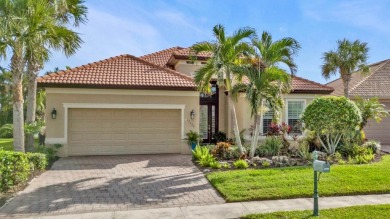 Resort-Style Living Awaits in This Stunning Waterfront Home! on Riverwood Golf Club in Florida - for sale on GolfHomes.com, golf home, golf lot