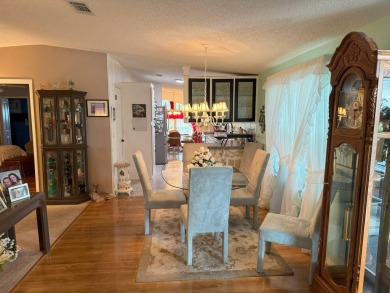 Discover why this highly sought-after two-bedroom, two-bathroom on Four Lakes Golf Club in Florida - for sale on GolfHomes.com, golf home, golf lot
