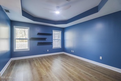 This home is centally located in Timber Ridge known for it's on Pass Christian Isles Golf Club in Mississippi - for sale on GolfHomes.com, golf home, golf lot