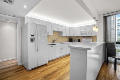 Luxurious Corner Condo in Boca West! Experience resort-style on Boca West Golf and Country Club in Florida - for sale on GolfHomes.com, golf home, golf lot