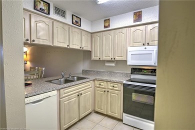 Enjoy maintenance-free living in this beautifully furnished on  in Florida - for sale on GolfHomes.com, golf home, golf lot
