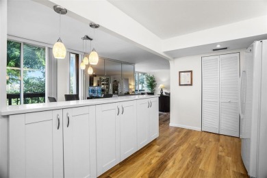 Luxurious Corner Condo in Boca West! Experience resort-style on Boca West Golf and Country Club in Florida - for sale on GolfHomes.com, golf home, golf lot