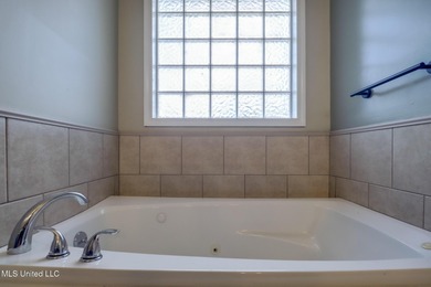 This home is centally located in Timber Ridge known for it's on Pass Christian Isles Golf Club in Mississippi - for sale on GolfHomes.com, golf home, golf lot