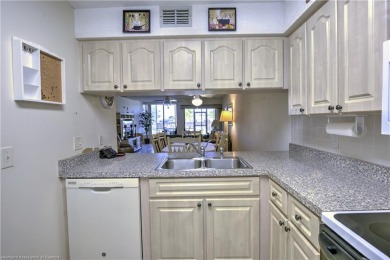 Enjoy maintenance-free living in this beautifully furnished on  in Florida - for sale on GolfHomes.com, golf home, golf lot