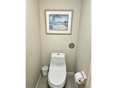 Enjoy maintenance-free living in this beautifully furnished on  in Florida - for sale on GolfHomes.com, golf home, golf lot