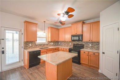 Welcome to your dream home in a beautiful gated community with on Carolina Lakes Country Club in North Carolina - for sale on GolfHomes.com, golf home, golf lot