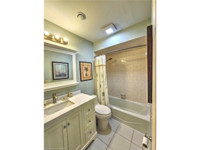 Enjoy maintenance-free living in this beautifully furnished on  in Florida - for sale on GolfHomes.com, golf home, golf lot