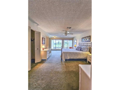 Enjoy maintenance-free living in this beautifully furnished on  in Florida - for sale on GolfHomes.com, golf home, golf lot