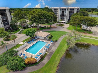 Luxurious Corner Condo in Boca West! Experience resort-style on Boca West Golf and Country Club in Florida - for sale on GolfHomes.com, golf home, golf lot