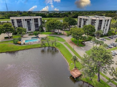 Luxurious Corner Condo in Boca West! Experience resort-style on Boca West Golf and Country Club in Florida - for sale on GolfHomes.com, golf home, golf lot