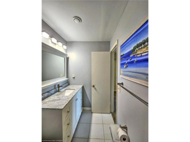 Enjoy maintenance-free living in this beautifully furnished on  in Florida - for sale on GolfHomes.com, golf home, golf lot