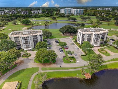 Luxurious Corner Condo in Boca West! Experience resort-style on Boca West Golf and Country Club in Florida - for sale on GolfHomes.com, golf home, golf lot