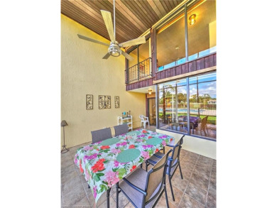 Enjoy maintenance-free living in this beautifully furnished on  in Florida - for sale on GolfHomes.com, golf home, golf lot