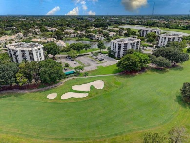 Luxurious Corner Condo in Boca West! Experience resort-style on Boca West Golf and Country Club in Florida - for sale on GolfHomes.com, golf home, golf lot