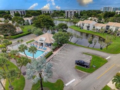 Luxurious Corner Condo in Boca West! Experience resort-style on Boca West Golf and Country Club in Florida - for sale on GolfHomes.com, golf home, golf lot
