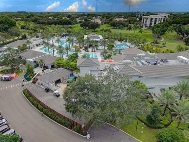 Luxurious Corner Condo in Boca West! Experience resort-style on Boca West Golf and Country Club in Florida - for sale on GolfHomes.com, golf home, golf lot