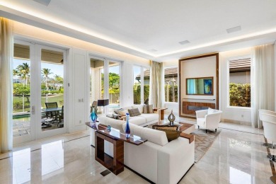 Indulge in the epitome of luxury living within this magnificent on Polo Club of Boca Raton in Florida - for sale on GolfHomes.com, golf home, golf lot