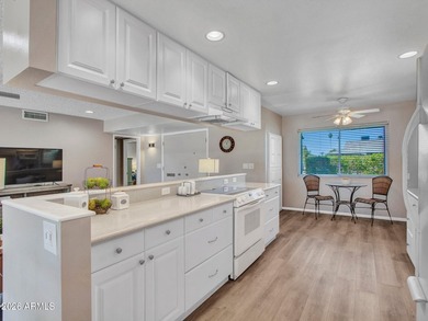 Welcome to your updated retreat in Sun City! This charming 2-bed on Sun City Lakes West and East in Arizona - for sale on GolfHomes.com, golf home, golf lot