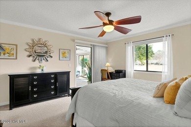 Sunny and bright townhome just minutes from Wrightsville Beach on Inland Greens Golf Course in North Carolina - for sale on GolfHomes.com, golf home, golf lot