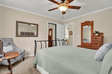 Sunny and bright townhome just minutes from Wrightsville Beach on Inland Greens Golf Course in North Carolina - for sale on GolfHomes.com, golf home, golf lot