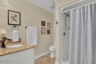 Sunny and bright townhome just minutes from Wrightsville Beach on Inland Greens Golf Course in North Carolina - for sale on GolfHomes.com, golf home, golf lot