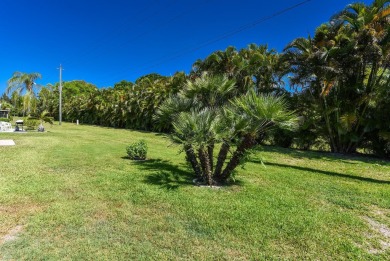 RARE HALF DUPLEX WITH PRIVATE BACKYARD! This 2-bedroom on Cypress Lakes Golf Course - West Palm Beach in Florida - for sale on GolfHomes.com, golf home, golf lot