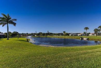 RARE HALF DUPLEX WITH PRIVATE BACKYARD! This 2-bedroom on Cypress Lakes Golf Course - West Palm Beach in Florida - for sale on GolfHomes.com, golf home, golf lot