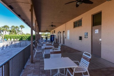 RARE HALF DUPLEX WITH PRIVATE BACKYARD! This 2-bedroom on Cypress Lakes Golf Course - West Palm Beach in Florida - for sale on GolfHomes.com, golf home, golf lot