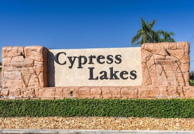 RARE HALF DUPLEX WITH PRIVATE BACKYARD! This 2-bedroom on Cypress Lakes Golf Course - West Palm Beach in Florida - for sale on GolfHomes.com, golf home, golf lot