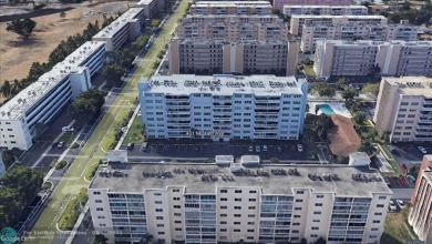 VERY WELL KEPT CONDO LARGER THAN THE TAX ROLLS WITH A RENOVATED on The Diplomat Golf Resort and Spa in Florida - for sale on GolfHomes.com, golf home, golf lot