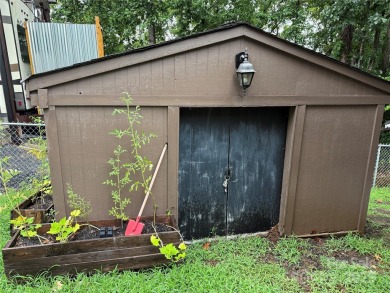 Plenty of space inside and out with this great unit. Double lots on The Tillery Tradition Country Club in North Carolina - for sale on GolfHomes.com, golf home, golf lot