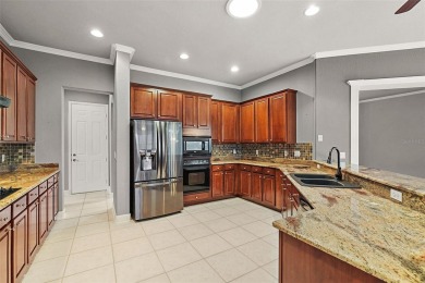 Welcome to this well appointed Del  Webb Hampton Model - 3 on Eagle Ridge At Spruce Creek Country Club in Florida - for sale on GolfHomes.com, golf home, golf lot