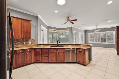 Welcome to this well appointed Del  Webb Hampton Model - 3 on Eagle Ridge At Spruce Creek Country Club in Florida - for sale on GolfHomes.com, golf home, golf lot