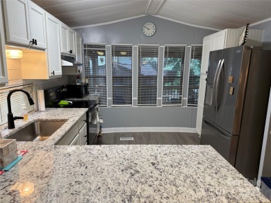 Plenty of space inside and out with this great unit. Double lots on The Tillery Tradition Country Club in North Carolina - for sale on GolfHomes.com, golf home, golf lot