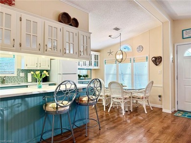 This is a home that has it all! There is no need for a list of on The Rookery At Marco in Florida - for sale on GolfHomes.com, golf home, golf lot