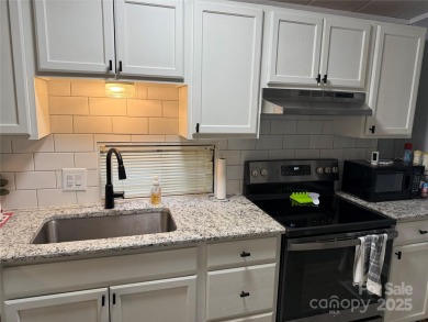 Plenty of space inside and out with this great unit. Double lots on The Tillery Tradition Country Club in North Carolina - for sale on GolfHomes.com, golf home, golf lot
