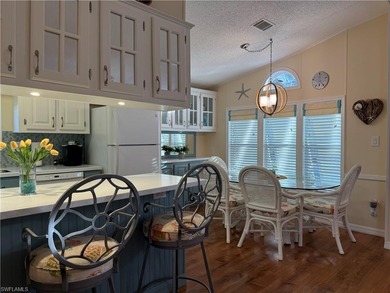 This is a home that has it all! There is no need for a list of on The Rookery At Marco in Florida - for sale on GolfHomes.com, golf home, golf lot