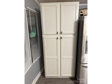 Plenty of space inside and out with this great unit. Double lots on The Tillery Tradition Country Club in North Carolina - for sale on GolfHomes.com, golf home, golf lot