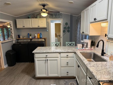Plenty of space inside and out with this great unit. Double lots on The Tillery Tradition Country Club in North Carolina - for sale on GolfHomes.com, golf home, golf lot