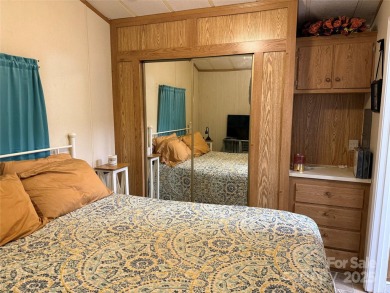 Plenty of space inside and out with this great unit. Double lots on The Tillery Tradition Country Club in North Carolina - for sale on GolfHomes.com, golf home, golf lot