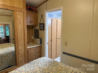 Plenty of space inside and out with this great unit. Double lots on The Tillery Tradition Country Club in North Carolina - for sale on GolfHomes.com, golf home, golf lot