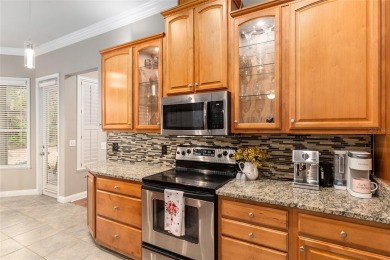 This stunning former builder's model home by Robinshore is on Haile Plantation Golf and Country Club in Florida - for sale on GolfHomes.com, golf home, golf lot