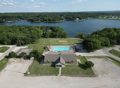 Coming Soon - Showings start June 10th!
 Get ready to fall in on Linn Valley Lakes - Deer Trace Golf Course in Kansas - for sale on GolfHomes.com, golf home, golf lot