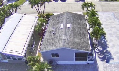 This is a home that has it all! There is no need for a list of on The Rookery At Marco in Florida - for sale on GolfHomes.com, golf home, golf lot