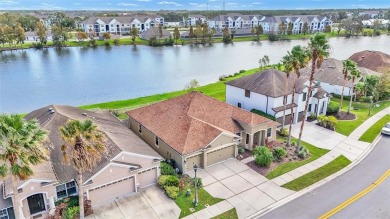 Stunning LAKE VIEWS welcome you as you enter this beautiful on The Golf Club At Bridgewater in Florida - for sale on GolfHomes.com, golf home, golf lot