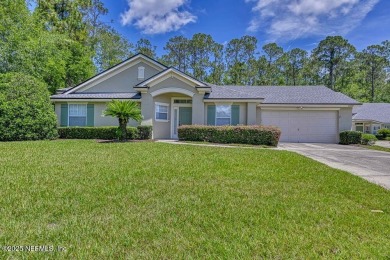 Welcome to easy, low-maintenance living in the heart of Fleming on Golf Club At Fleming Island in Florida - for sale on GolfHomes.com, golf home, golf lot