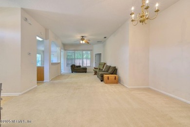 Welcome to easy, low-maintenance living in the heart of Fleming on Golf Club At Fleming Island in Florida - for sale on GolfHomes.com, golf home, golf lot