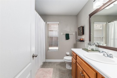 This stunning former builder's model home by Robinshore is on Haile Plantation Golf and Country Club in Florida - for sale on GolfHomes.com, golf home, golf lot